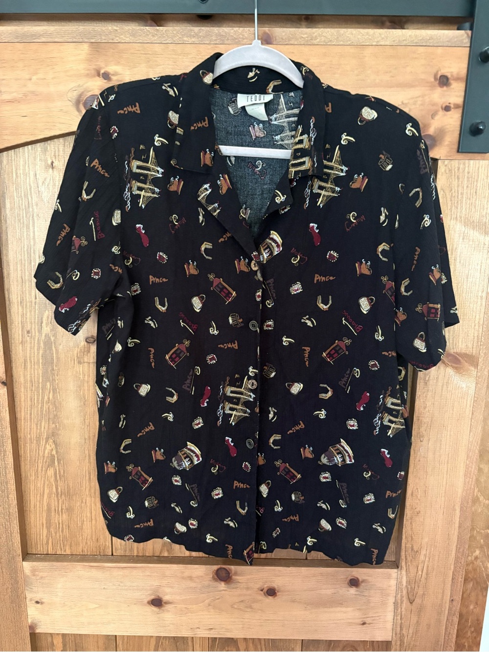 Women’s Vintage Teddi Sleeveless Shirt with Shoulder Pads.
